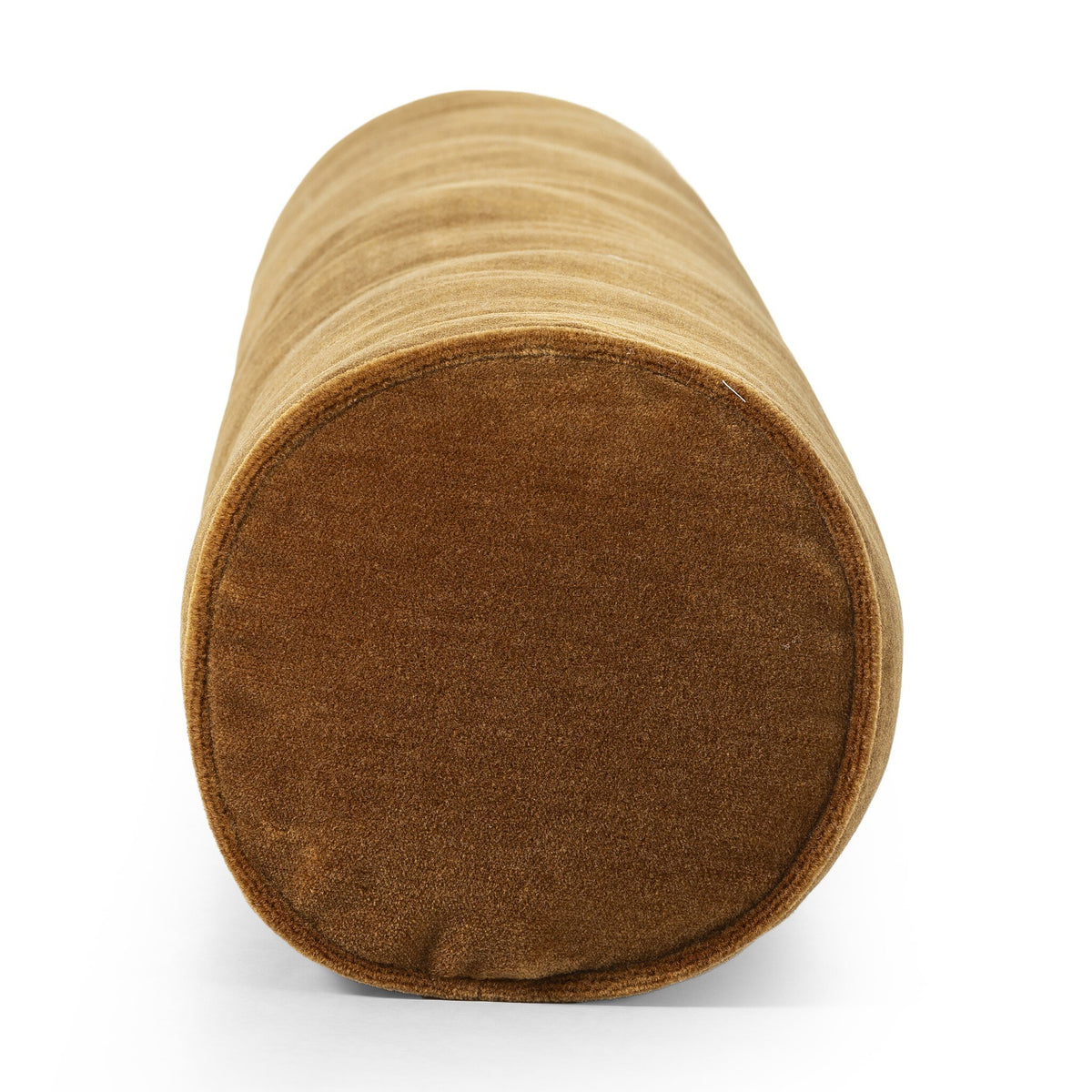 a brown cylinder pillow