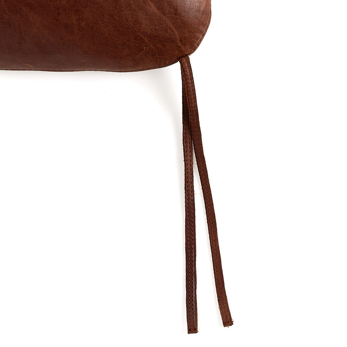 a brown leather bag with a string
