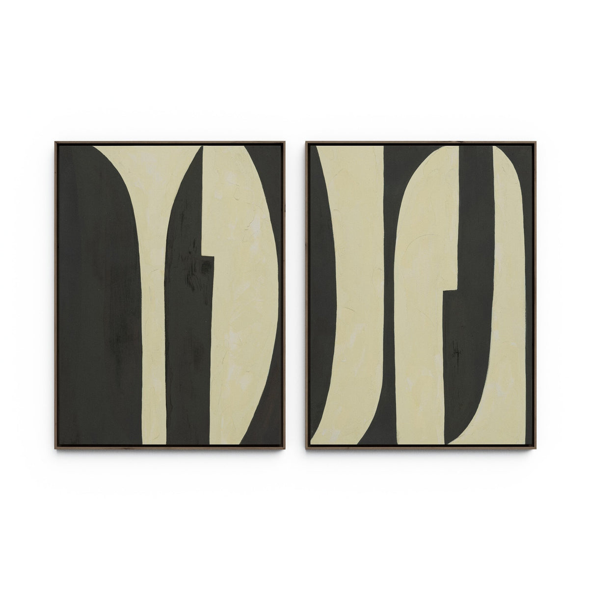 a pair of art pieces on a wall