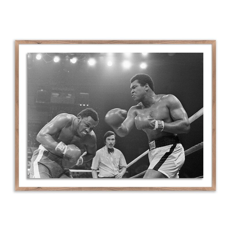 Muhammad Ali Punching Joe Frazier By Getty Images