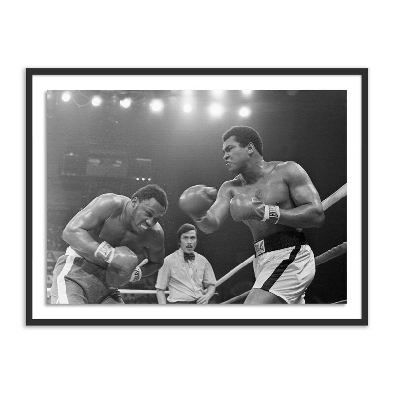 Muhammad Ali Punching Joe Frazier By Getty Images