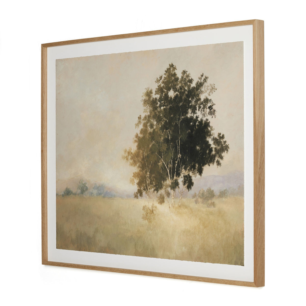 a framed painting of a tree