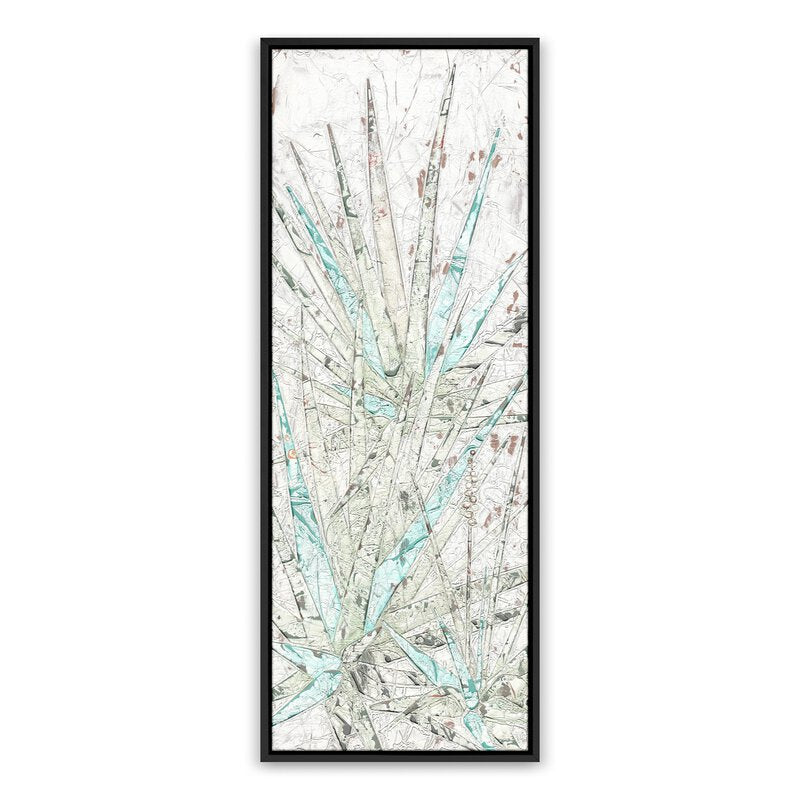 a framed picture of a plant