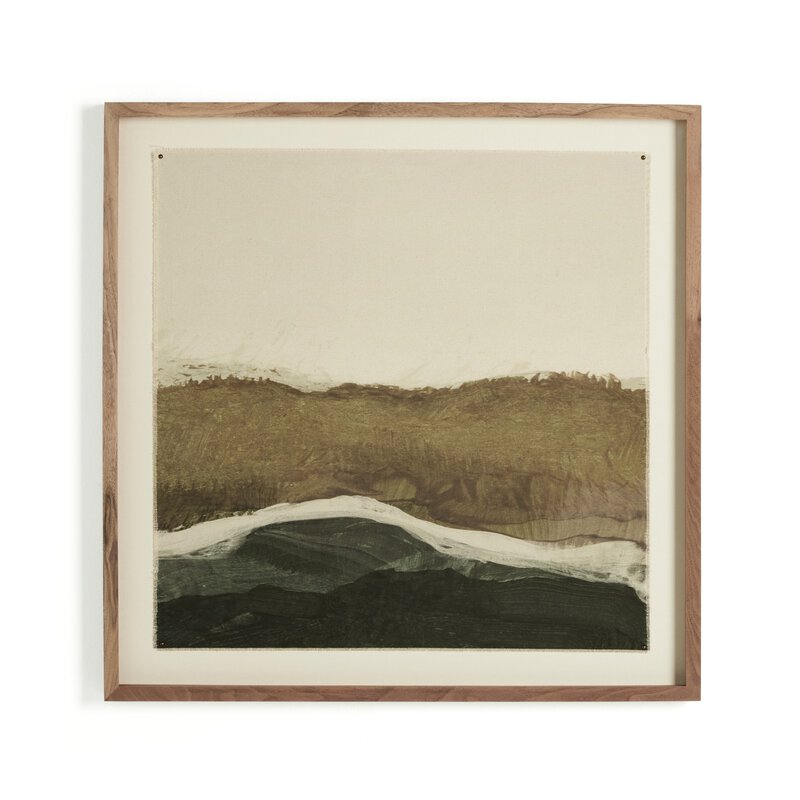 a framed painting of a landscape