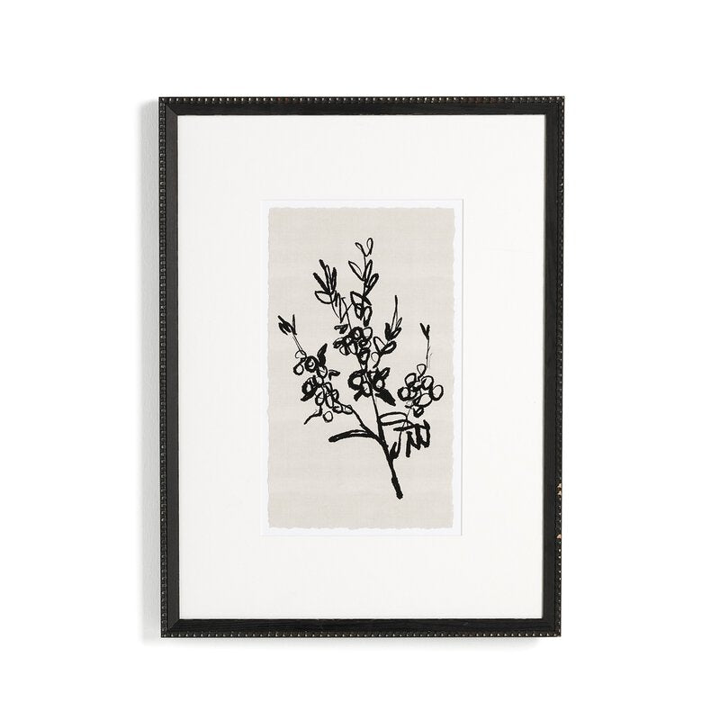 a framed picture of a plant