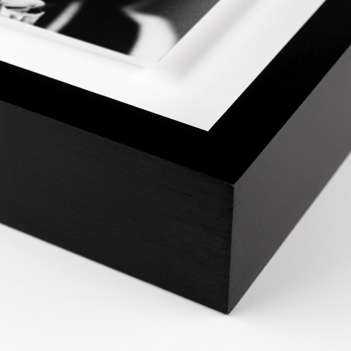 a close up of a black and white picture frame