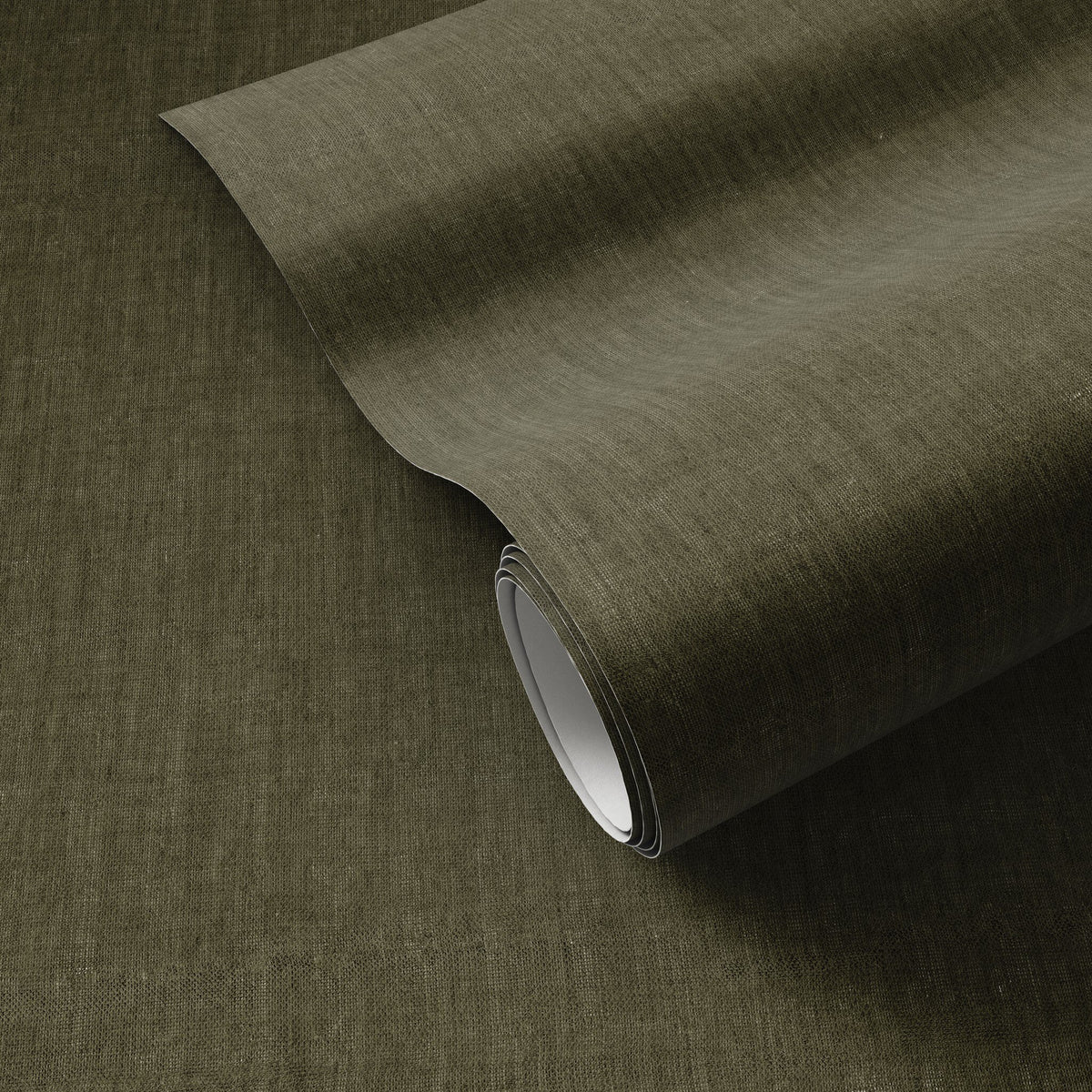 a roll of dark green fabric