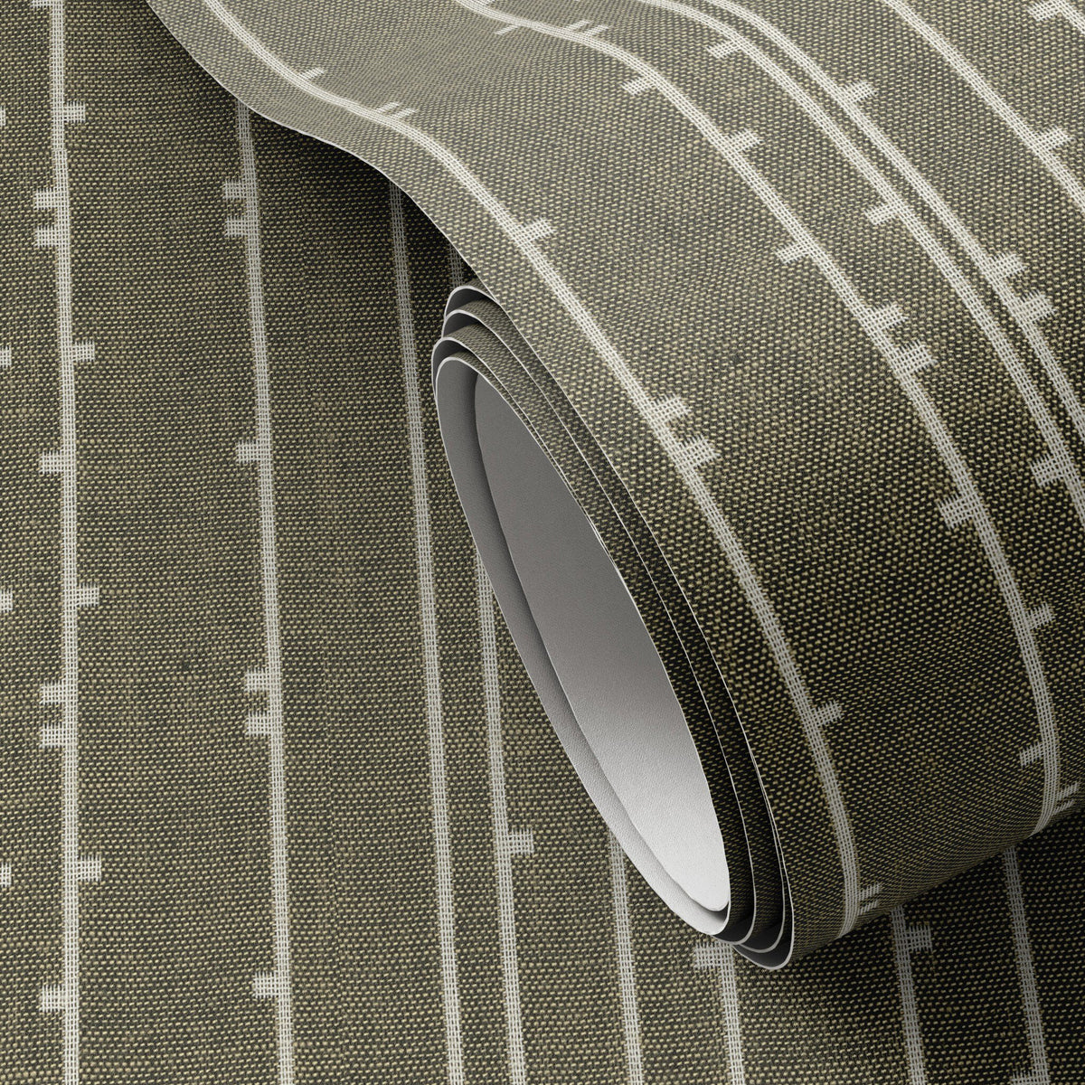 a roll of fabric with white lines