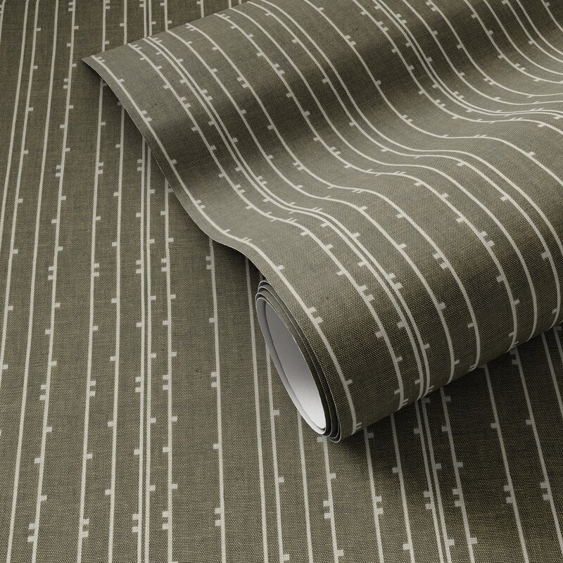a roll of wallpaper on a surface