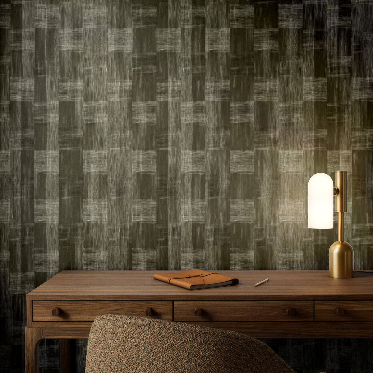 a desk with a lamp and a notebook