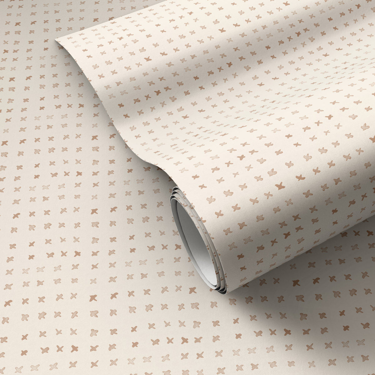 a roll of wallpaper on a white surface