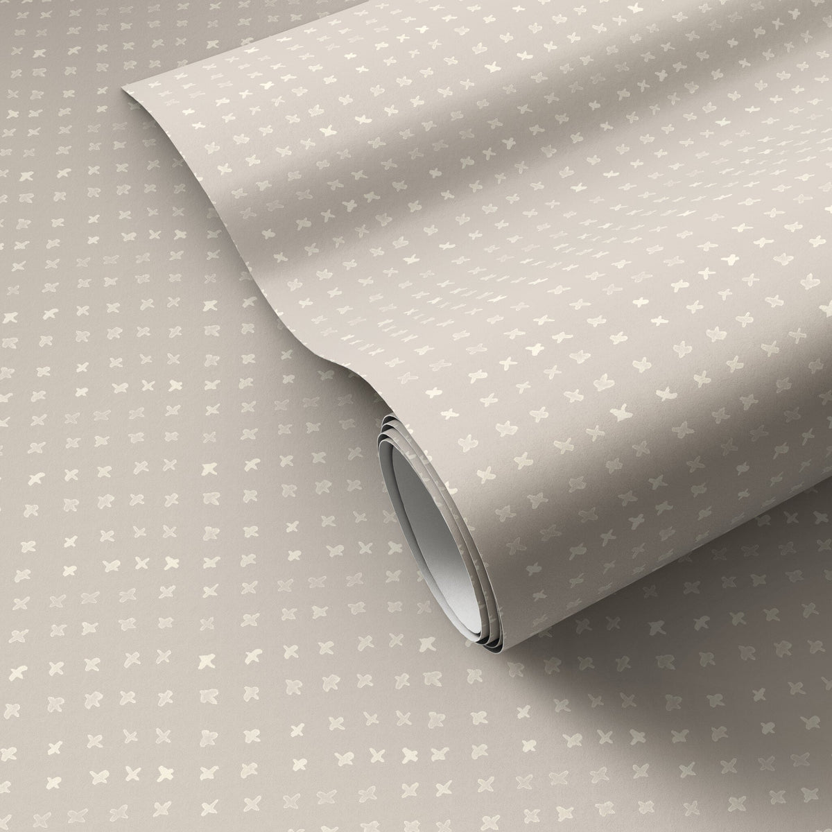 a roll of wallpaper on a surface