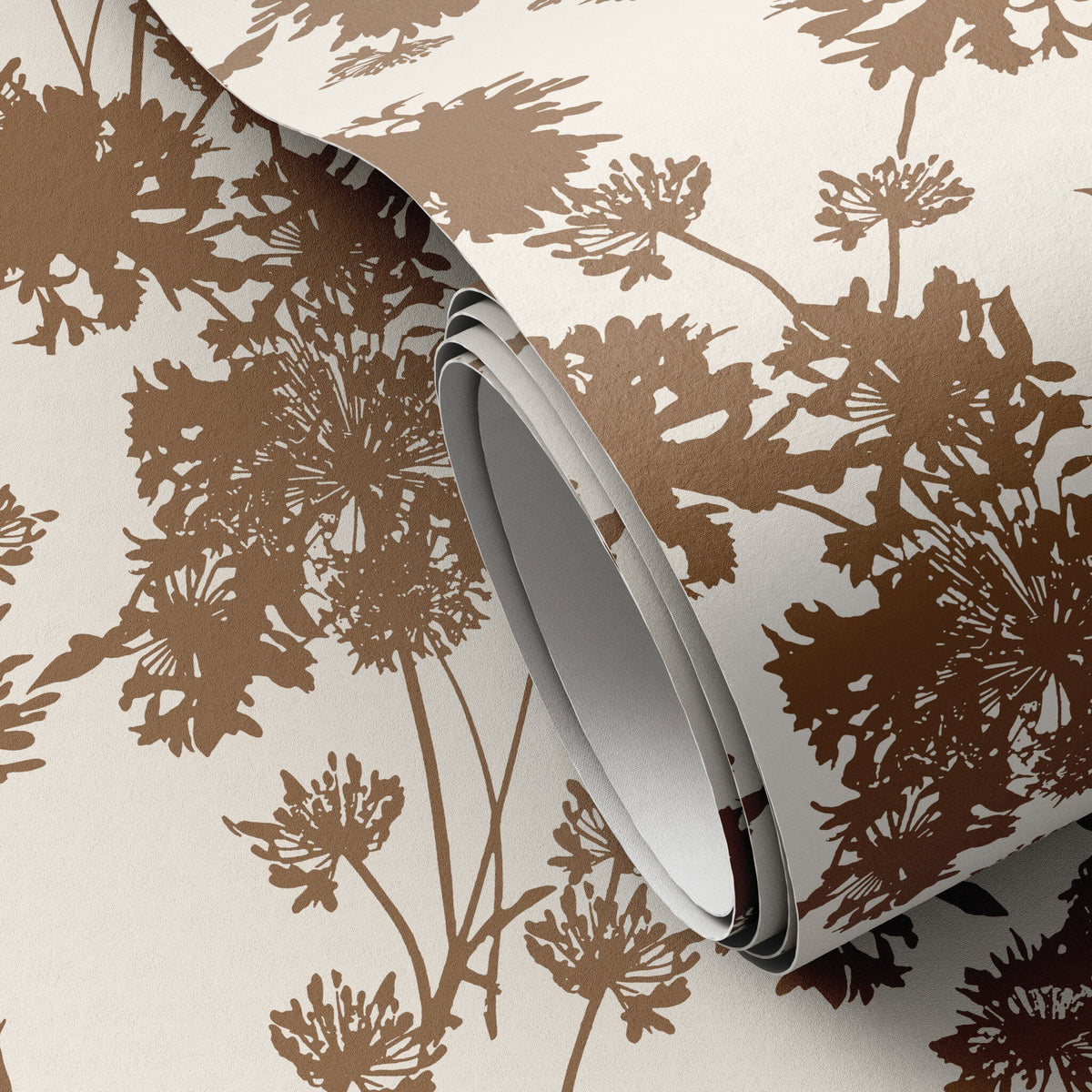 a roll of brown and white wallpaper