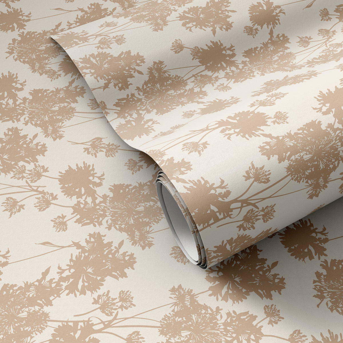a roll of wallpaper with brown leaves