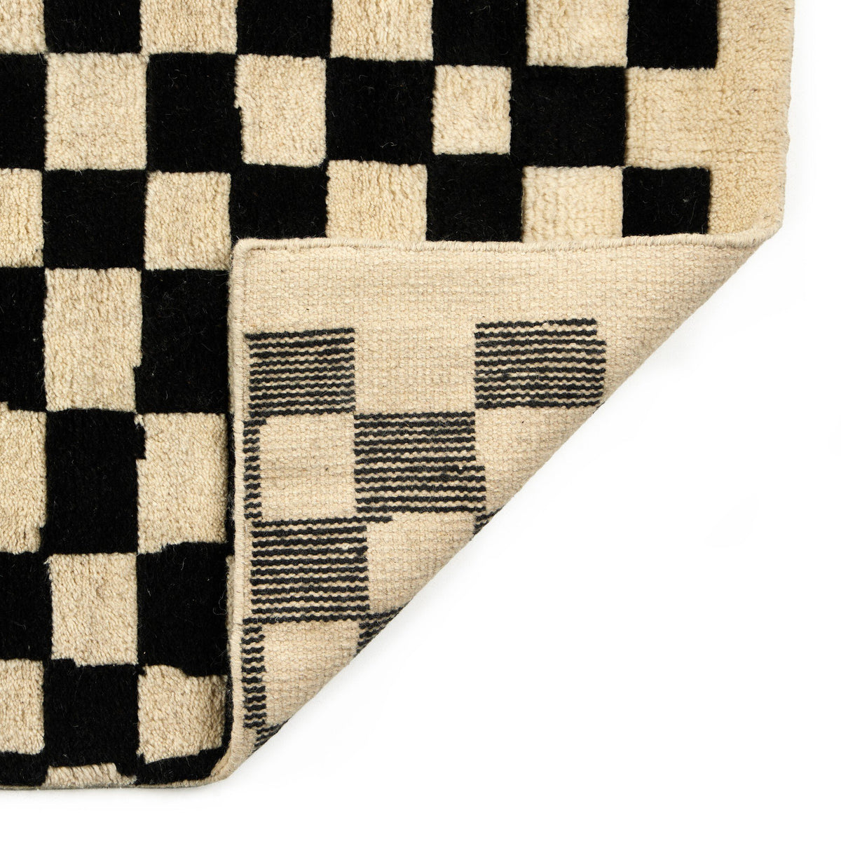 a black and white checkered rug