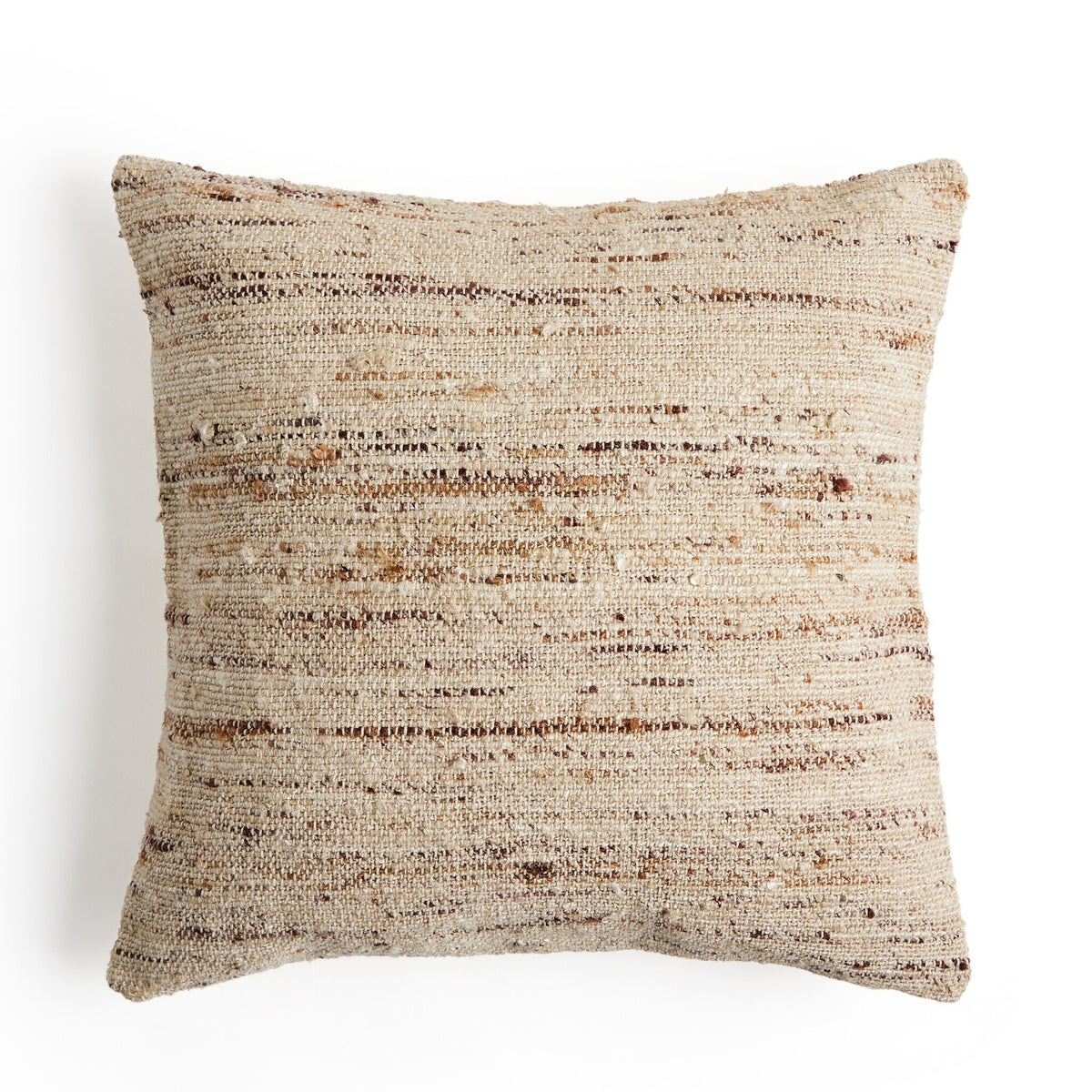 a pillow on a white surface
