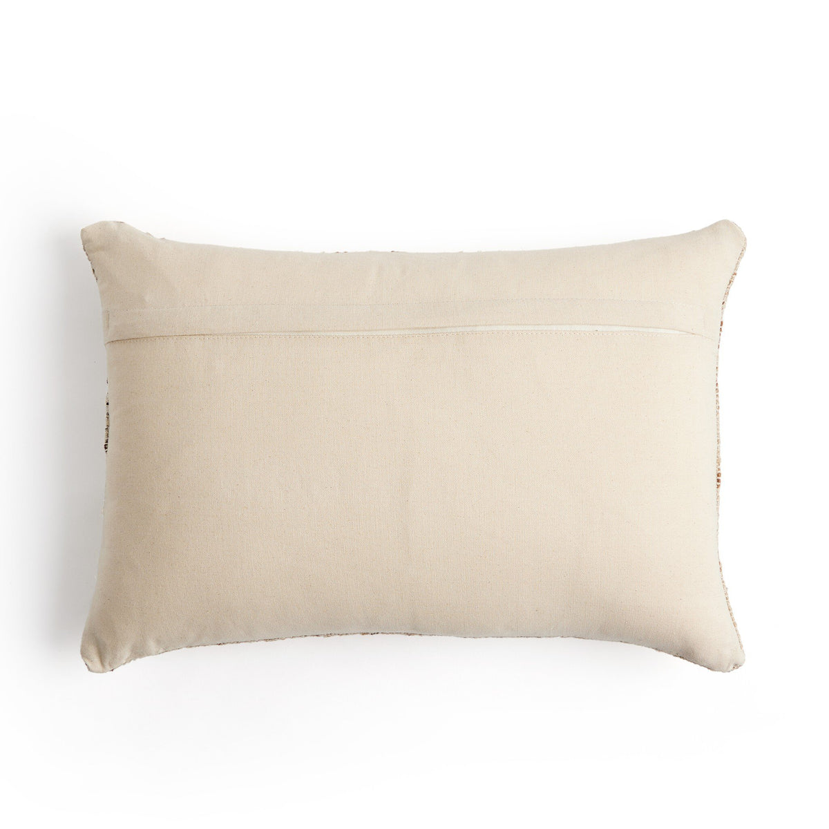 a white pillow on a white background