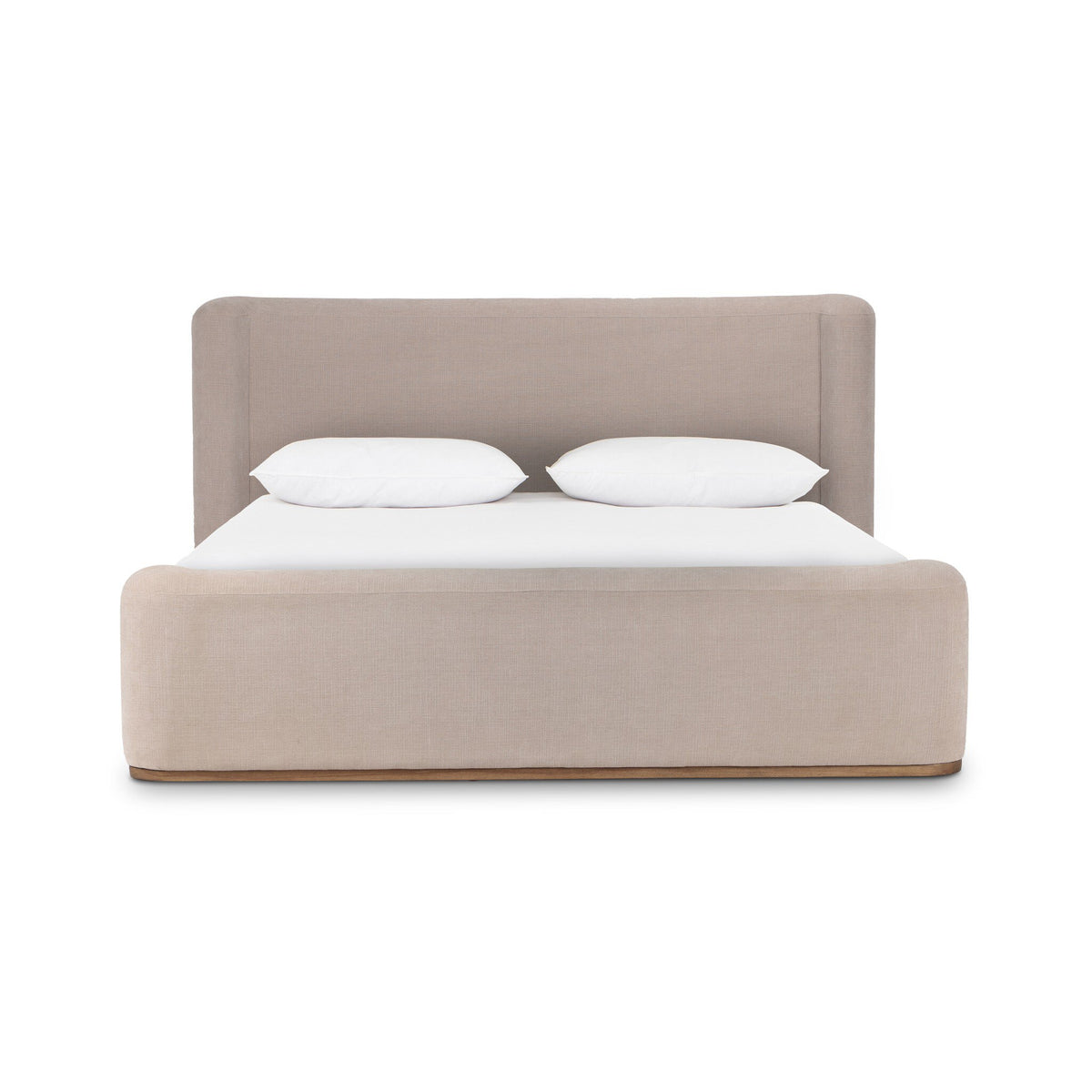 a bed with a white headboard