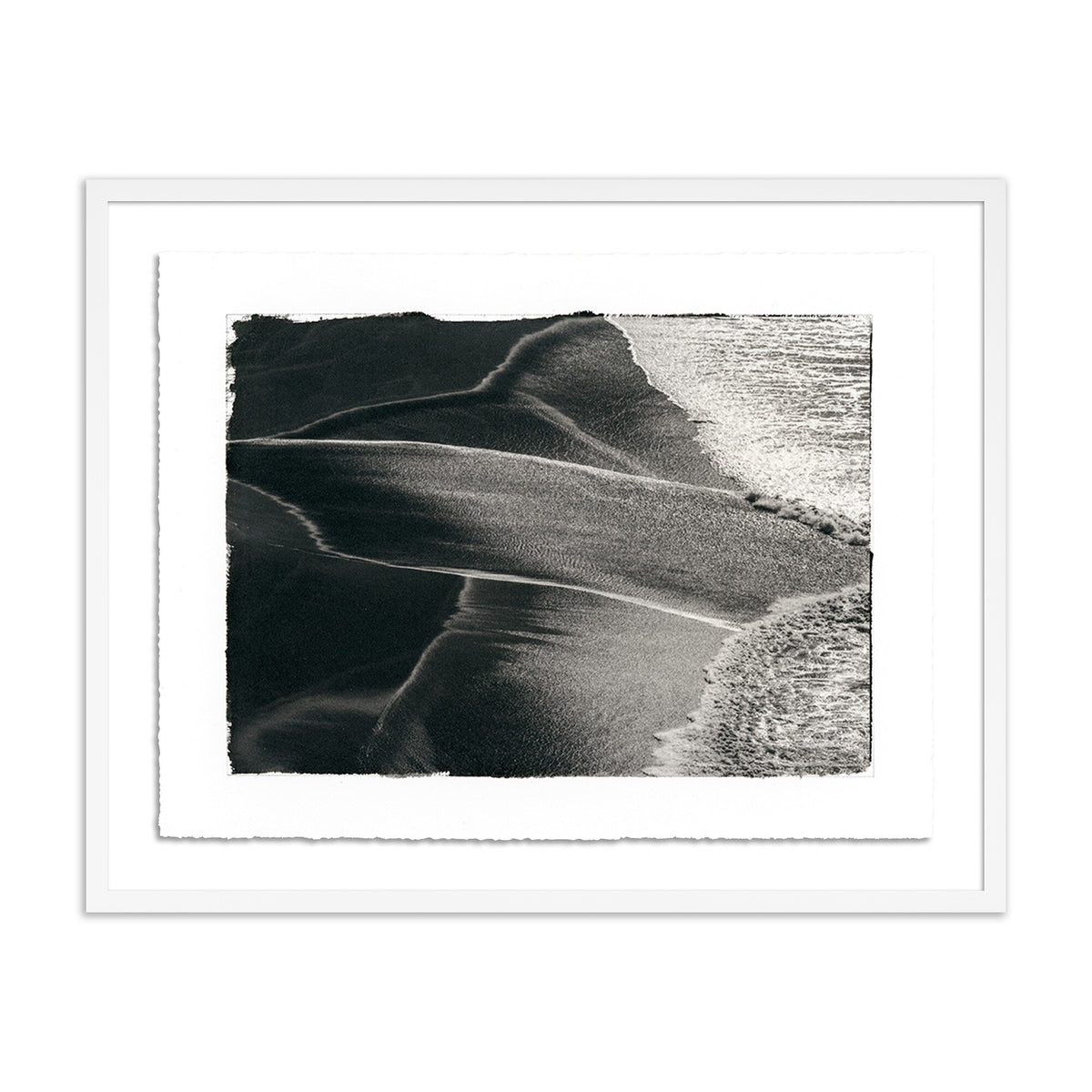 a black and white picture of a beach