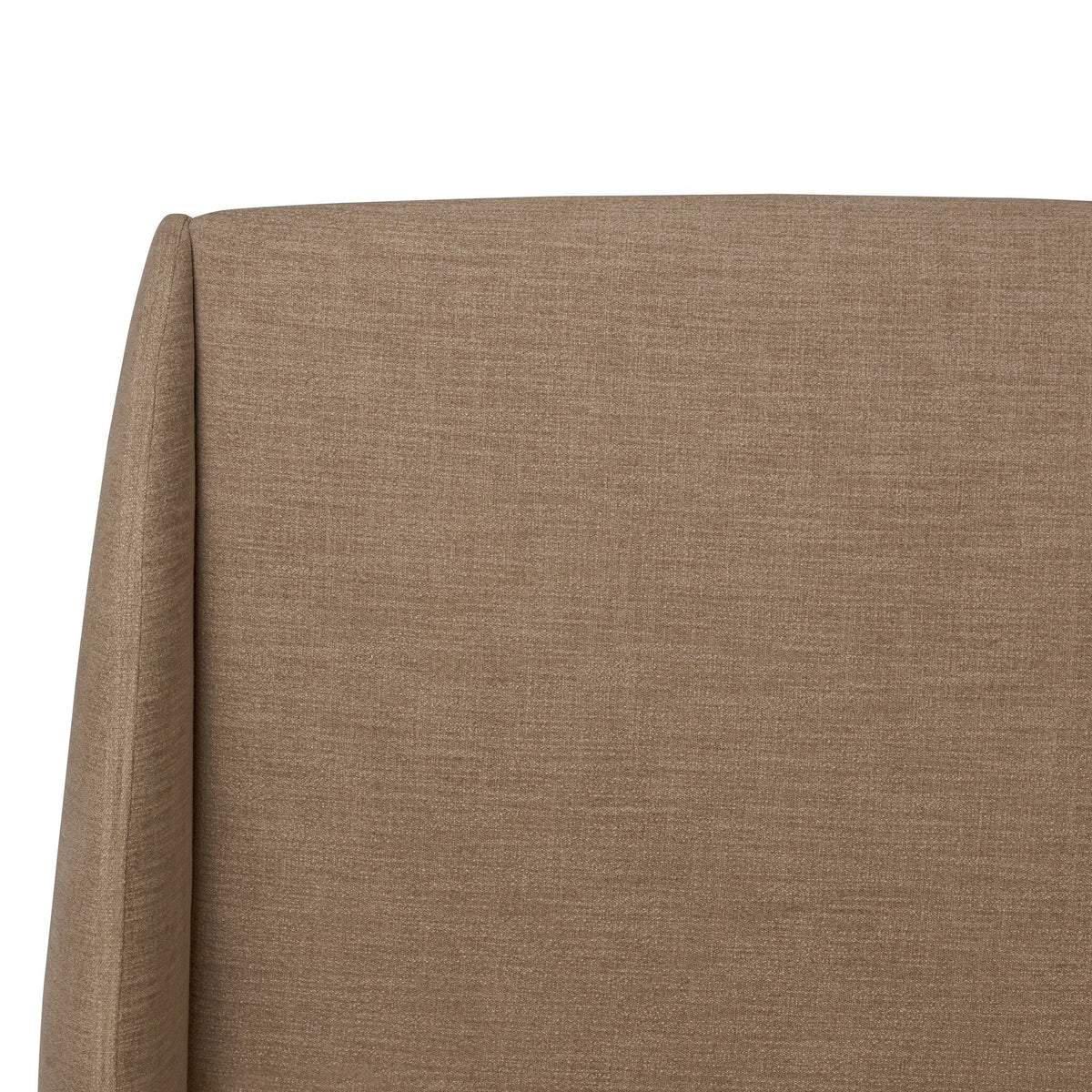 a close up of a brown fabric headboard