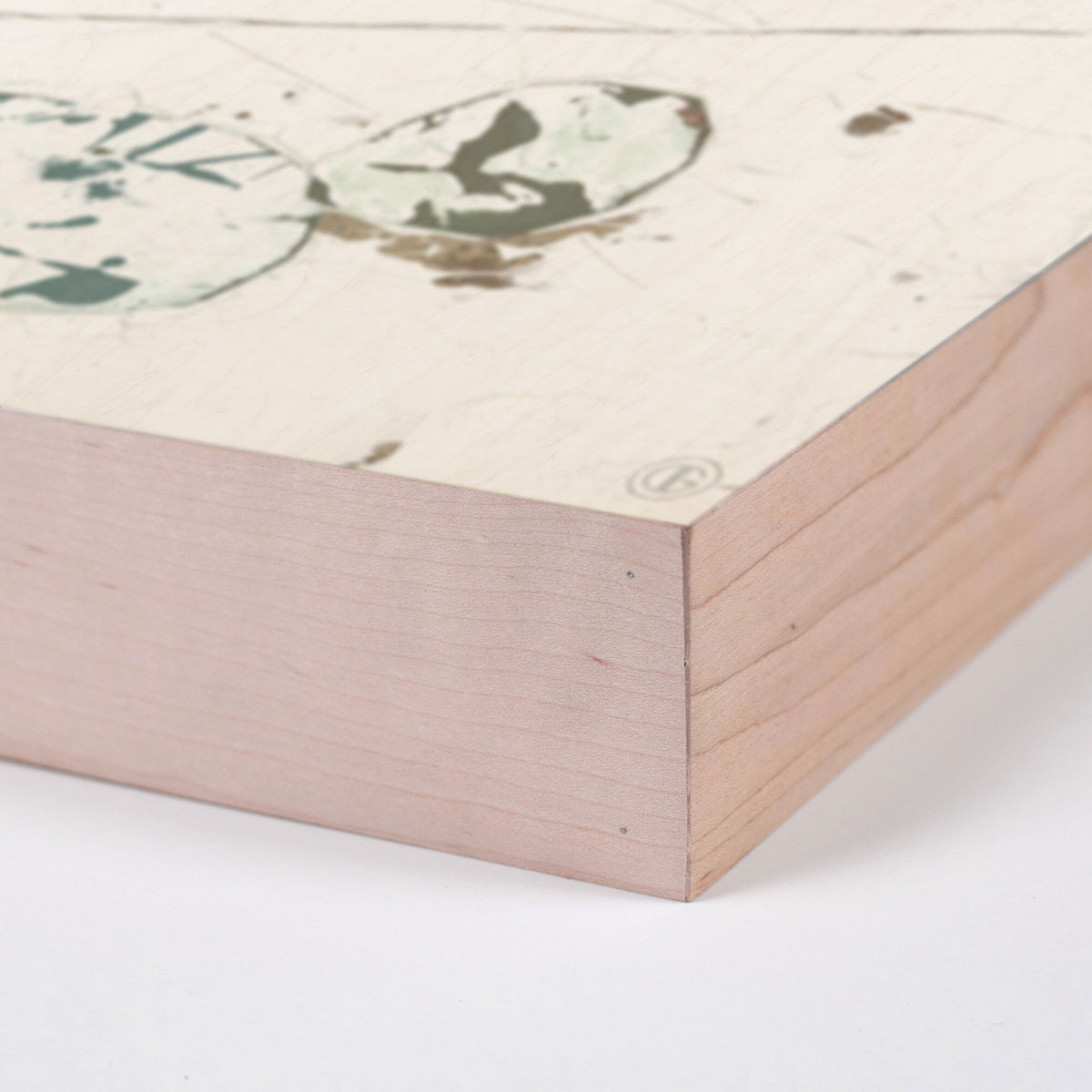 a piece of wood with a picture on it