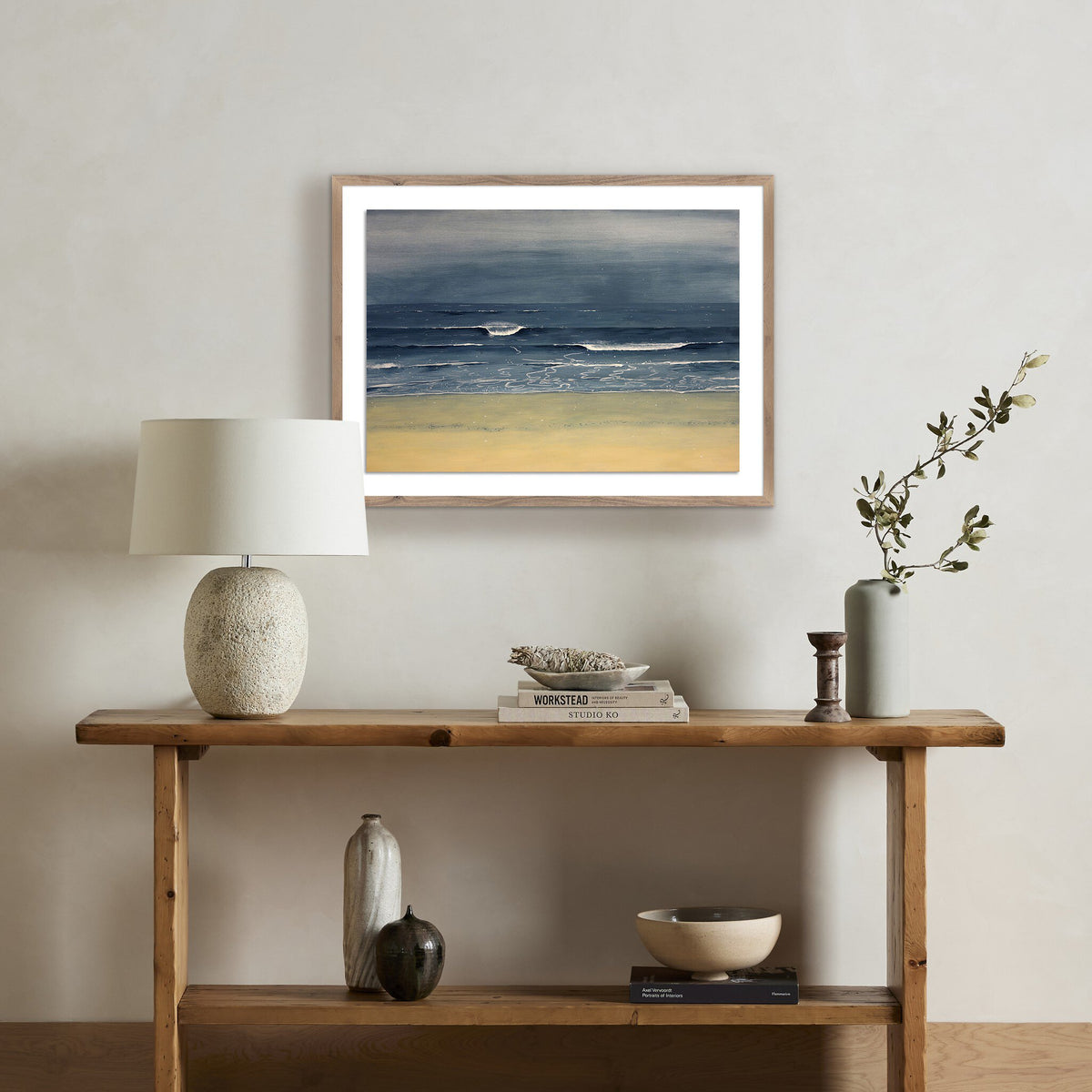 a shelf with a painting on it