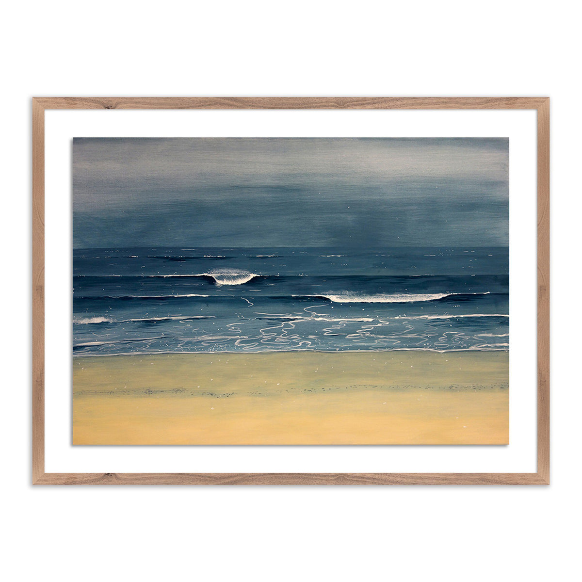 a framed picture of a beach