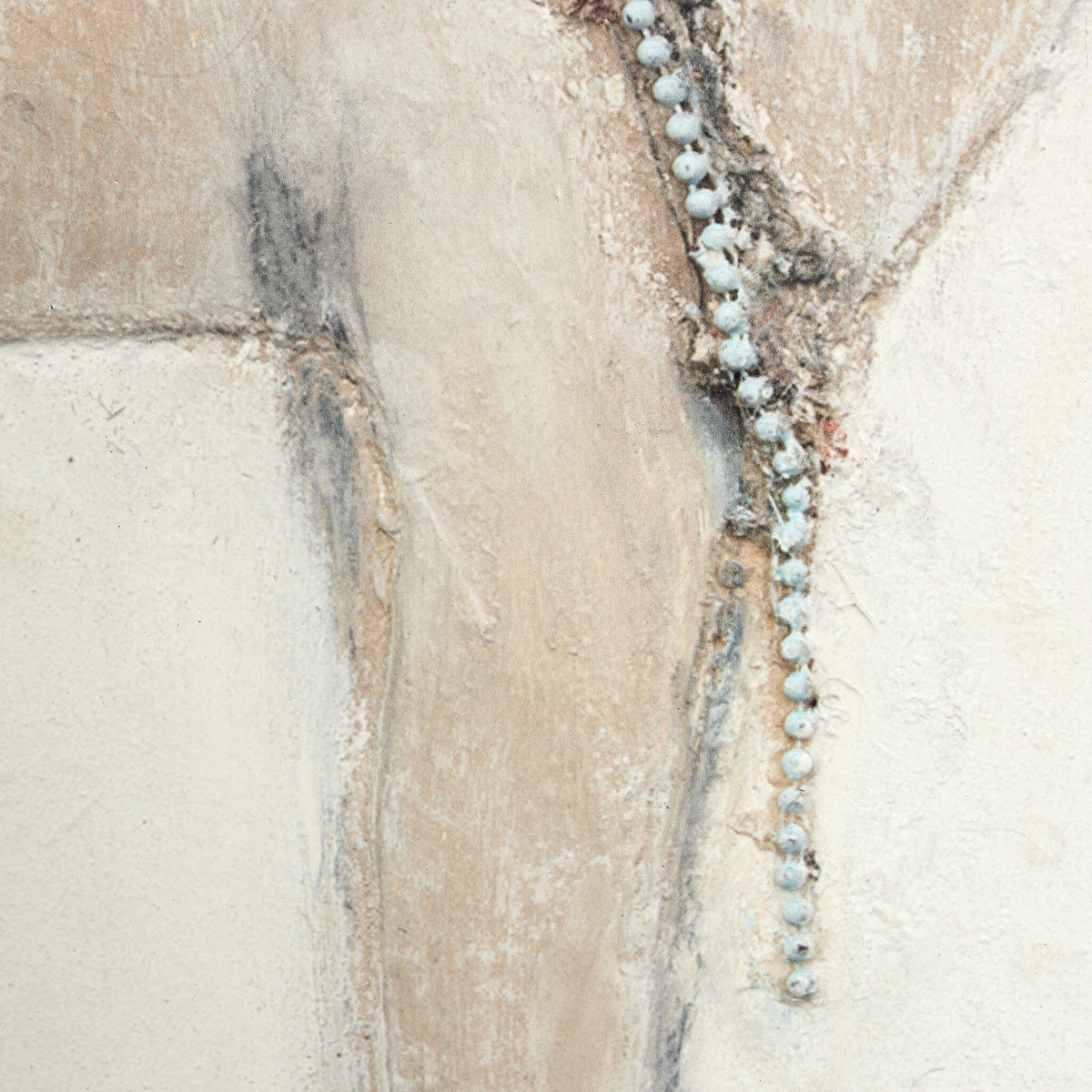 a stone wall with a crack in it