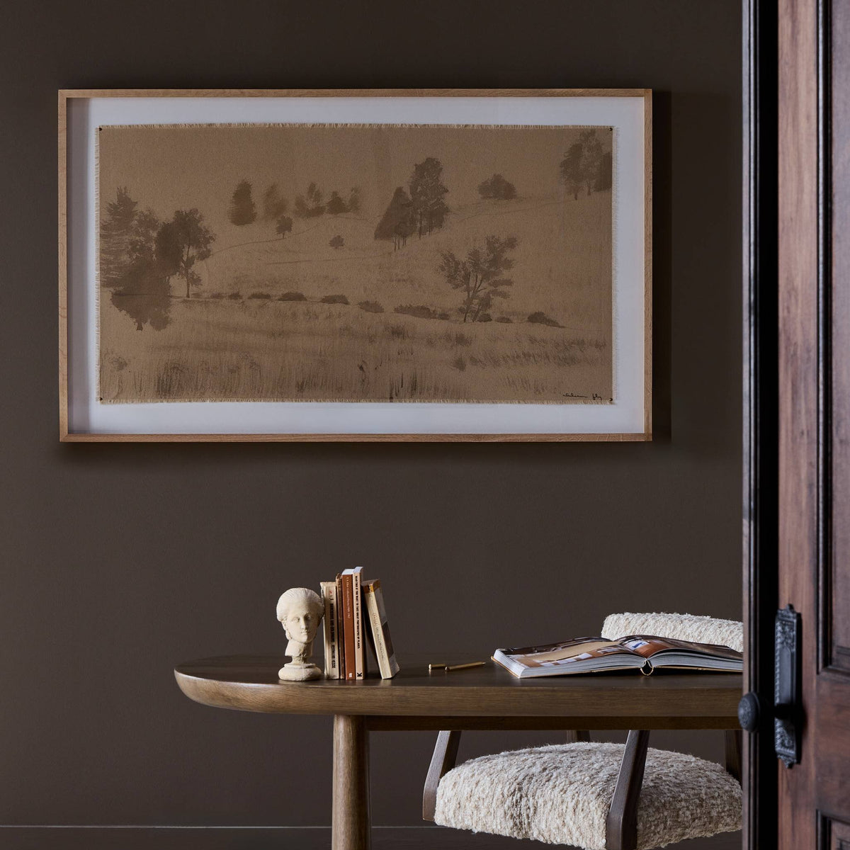 a framed picture on a wall