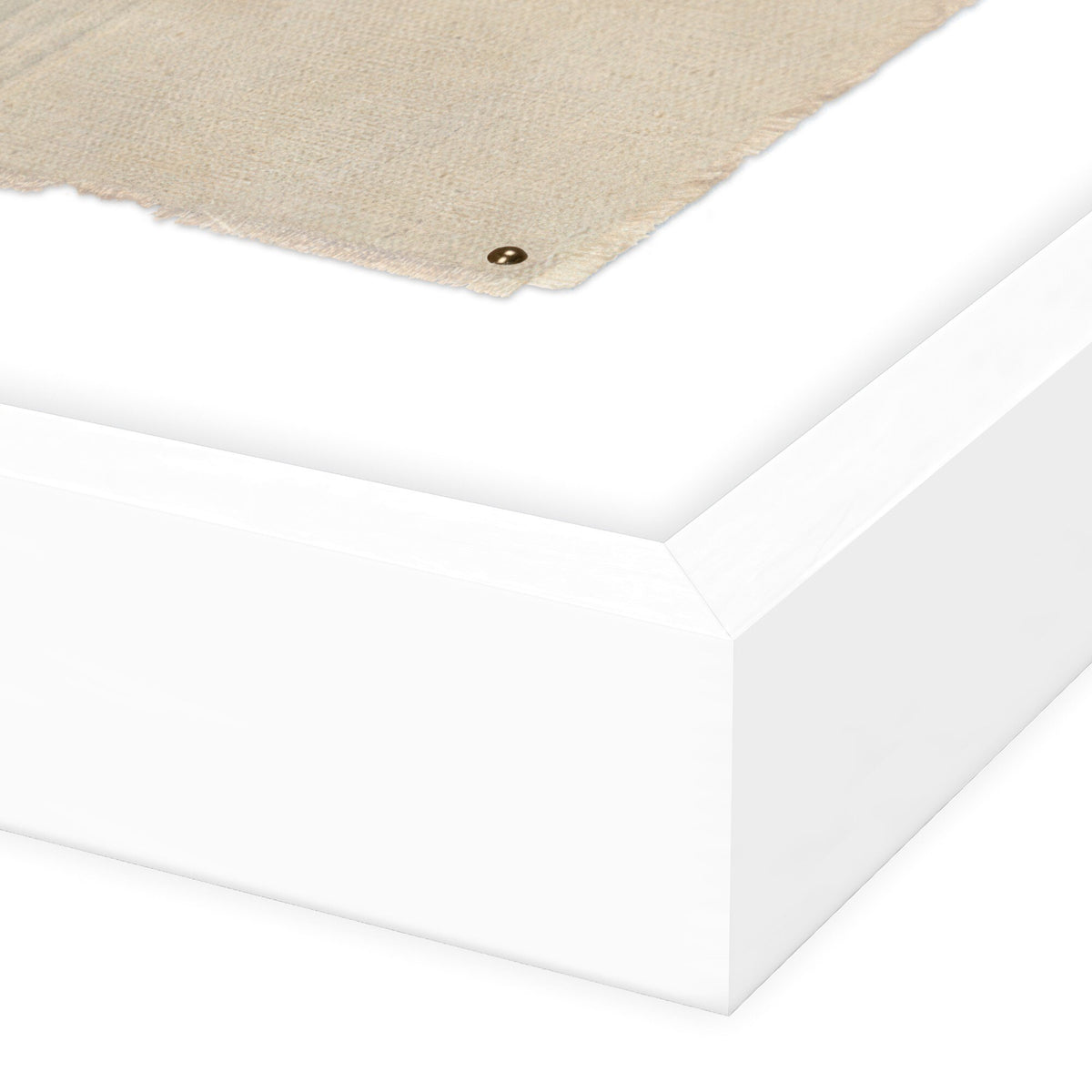 a white box with a piece of cloth on it