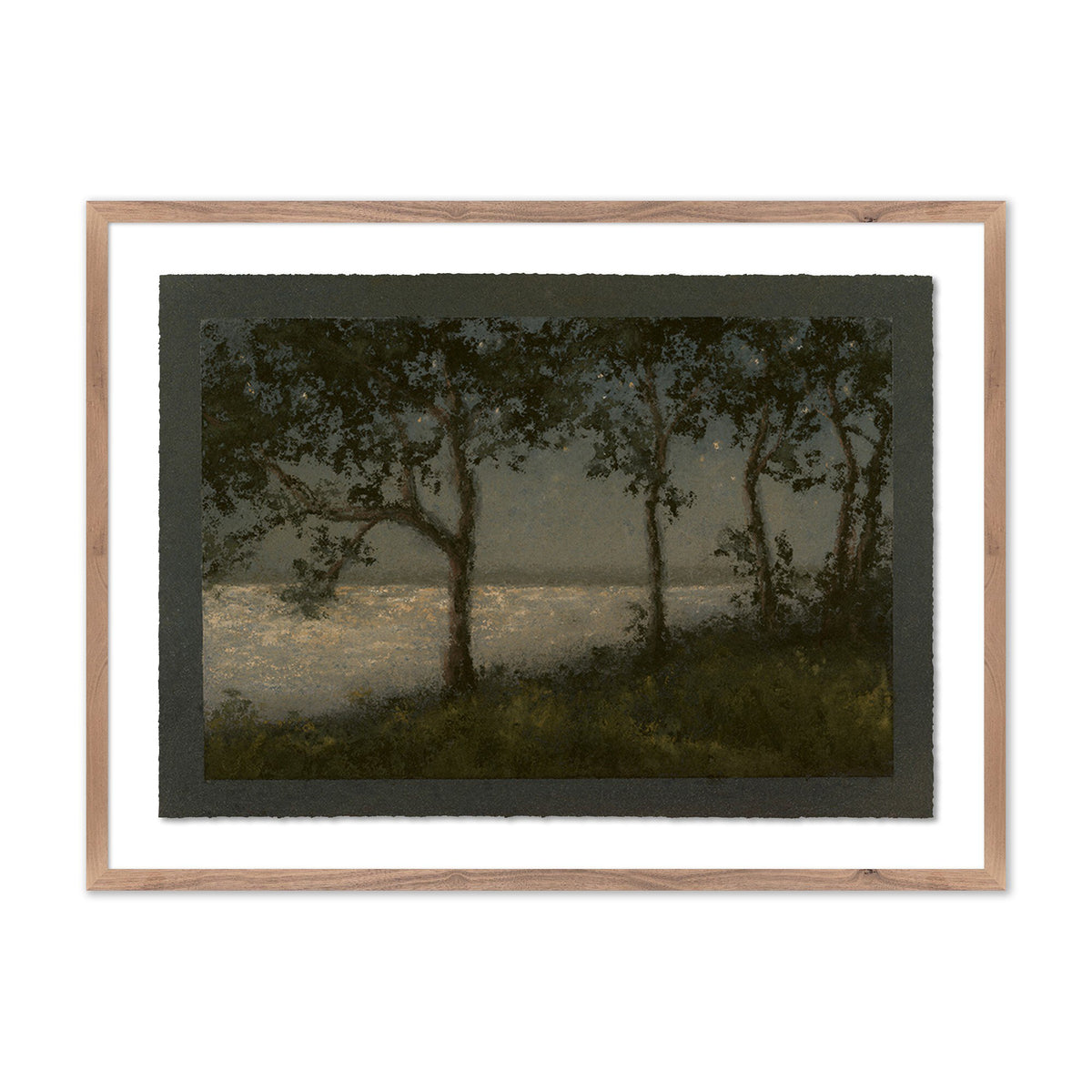 a framed picture of trees and water