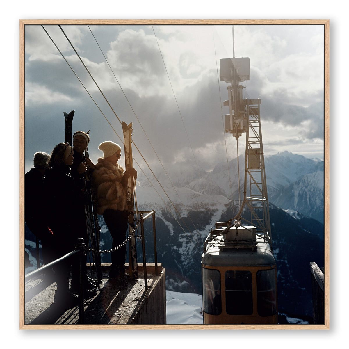 a group of people on a cable car