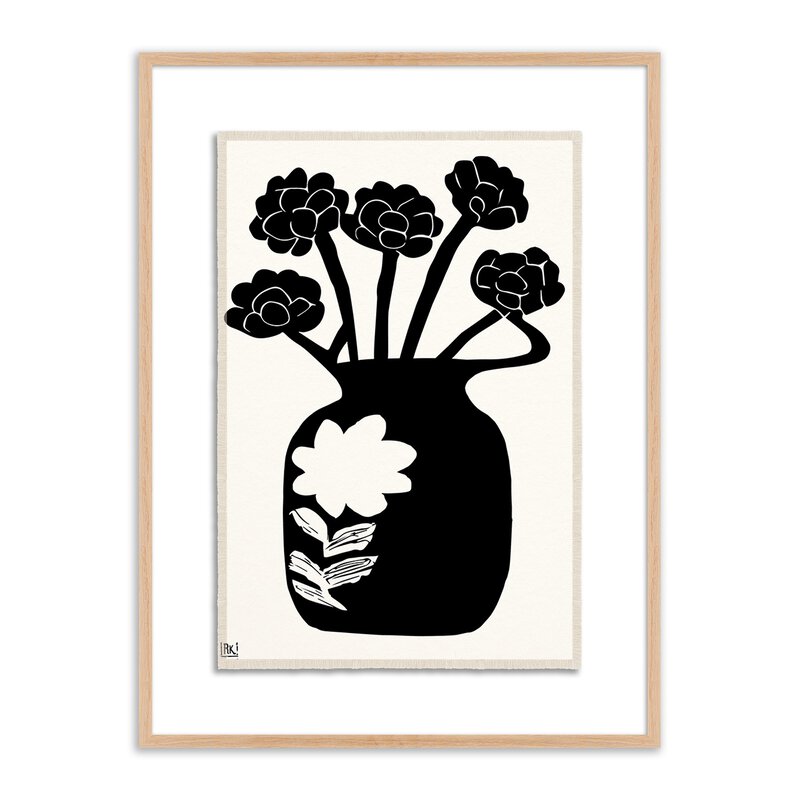 a black and white picture of flowers in a vase