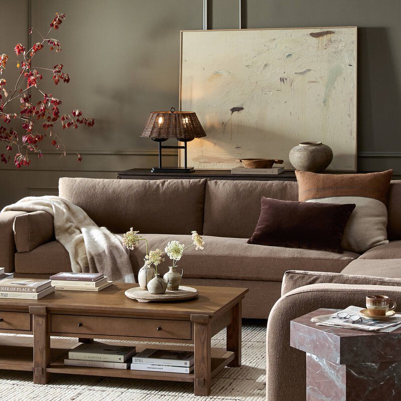 a living room with a couch and coffee table