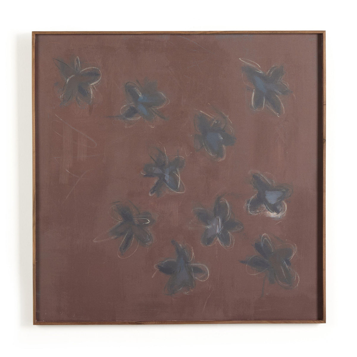 a framed picture of leaves
