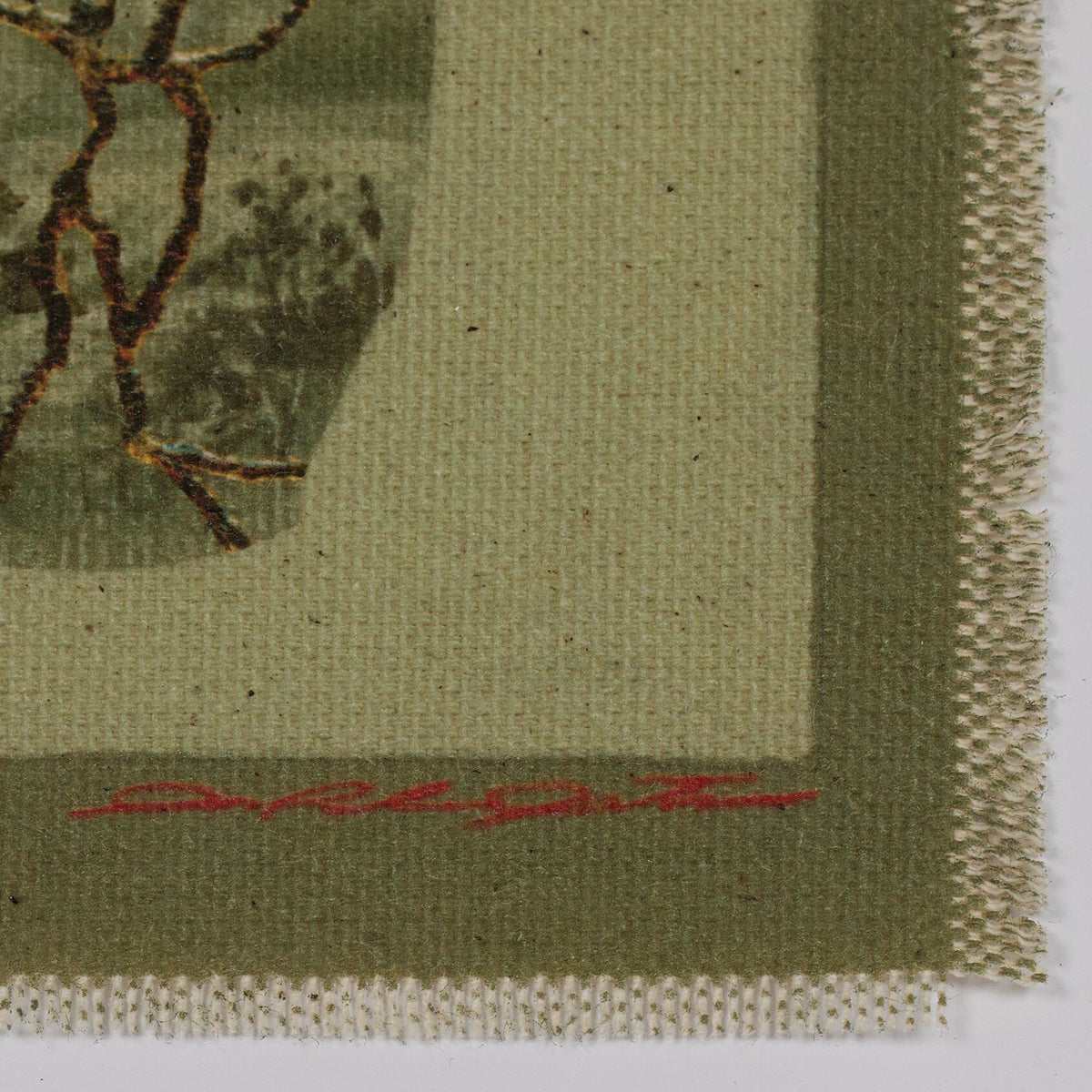 a piece of fabric with a picture of a vase