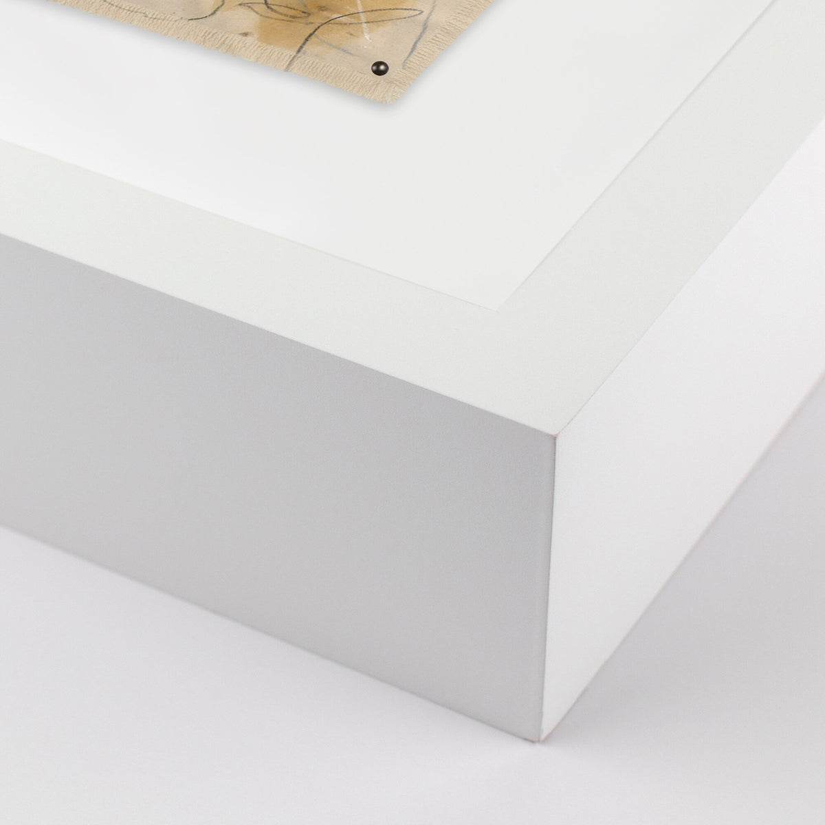 a white surface with a square object