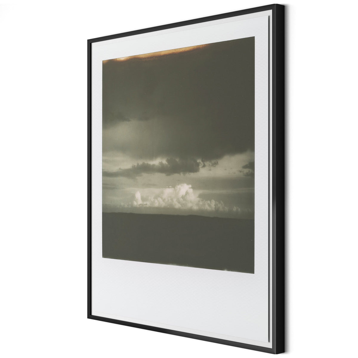 a framed picture of a landscape