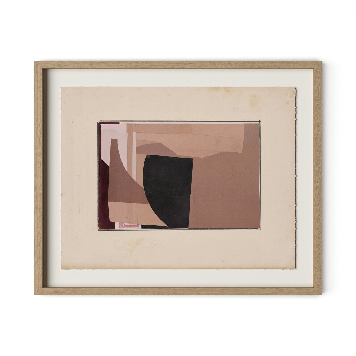 a framed art piece on a white wall