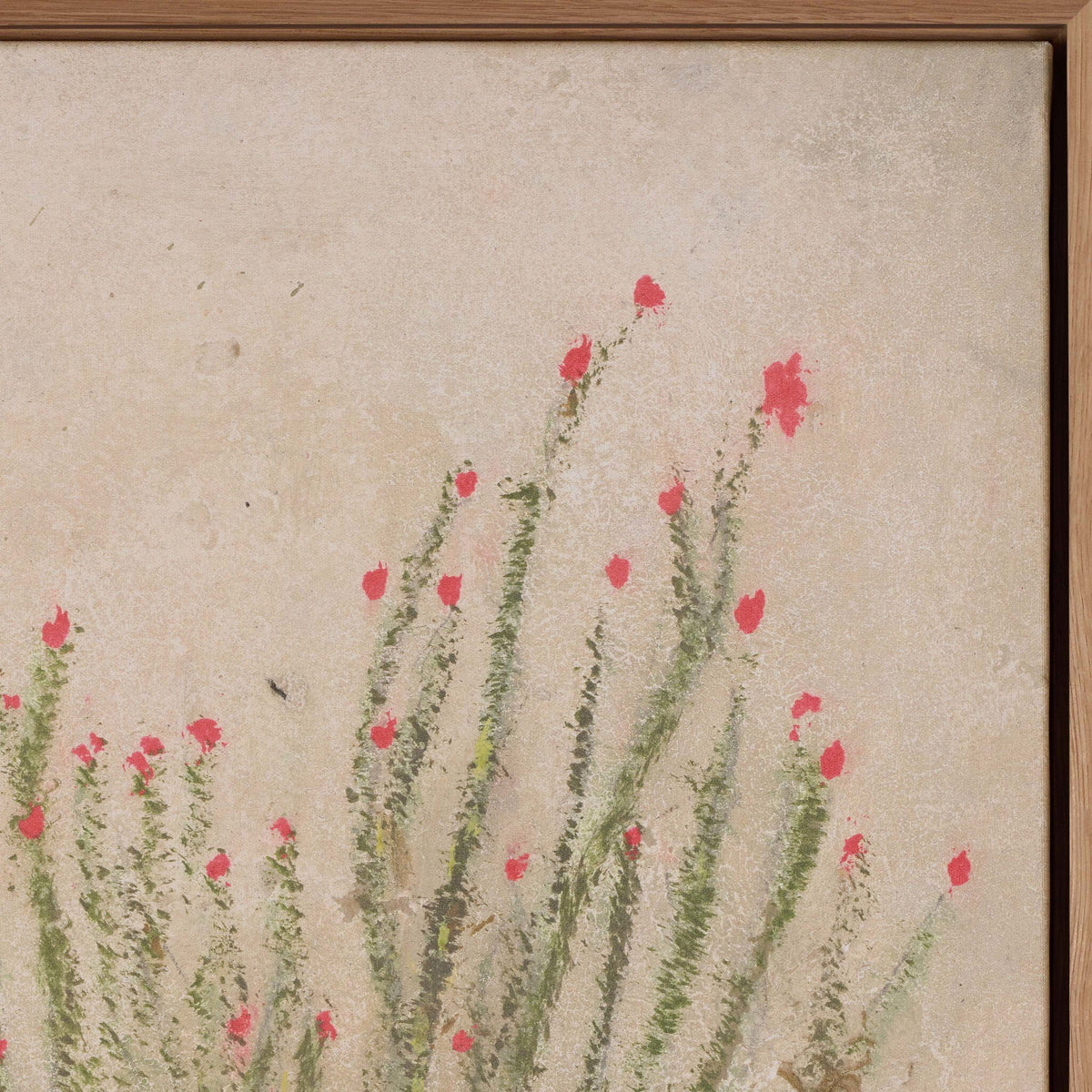 a painting of flowers in a frame
