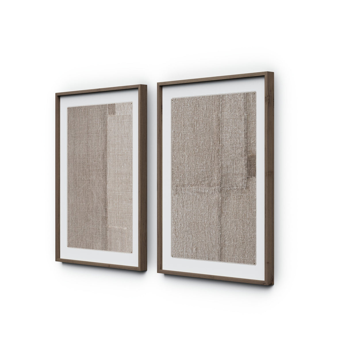 a two framed pictures on a white wall