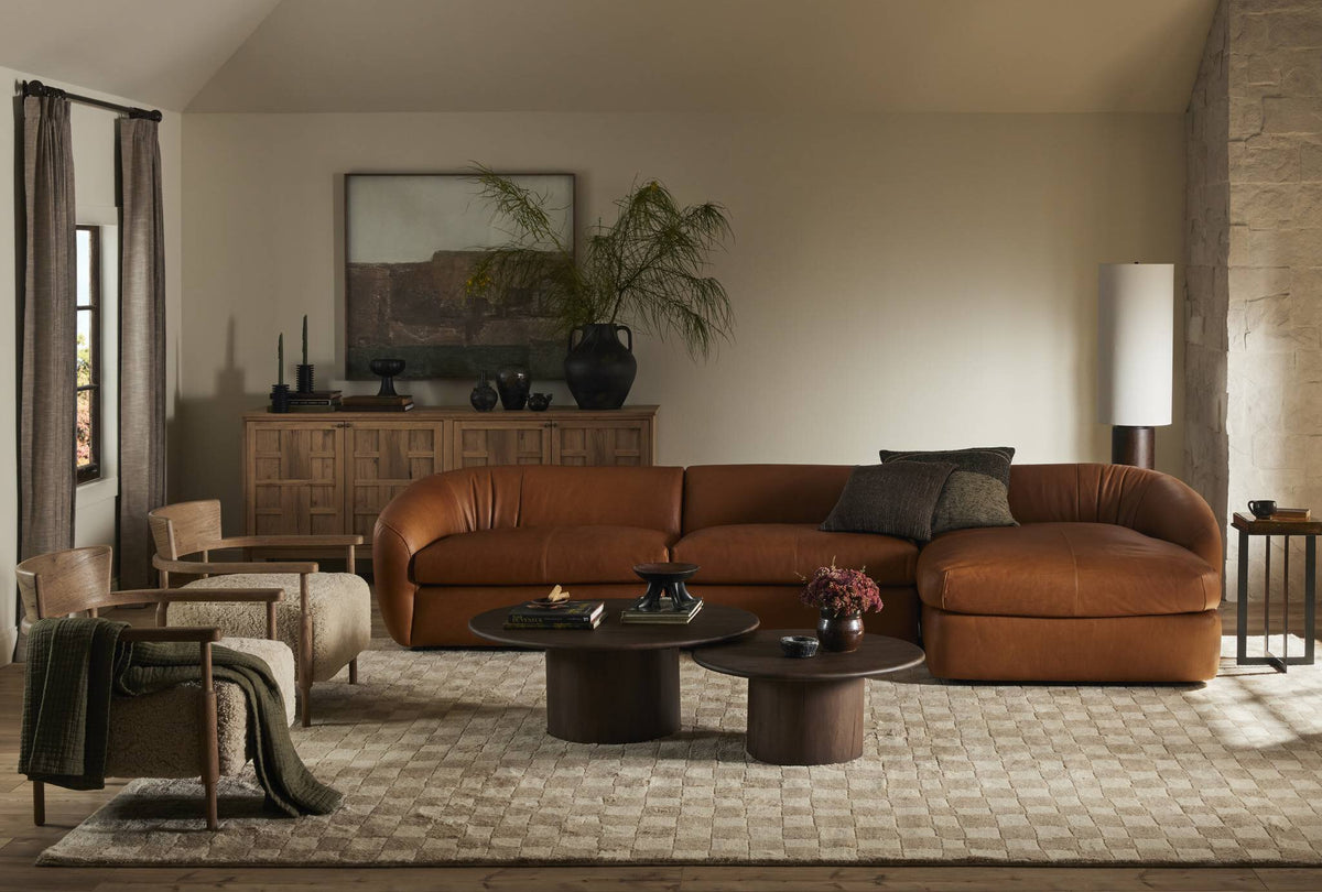a living room with a couch and a table