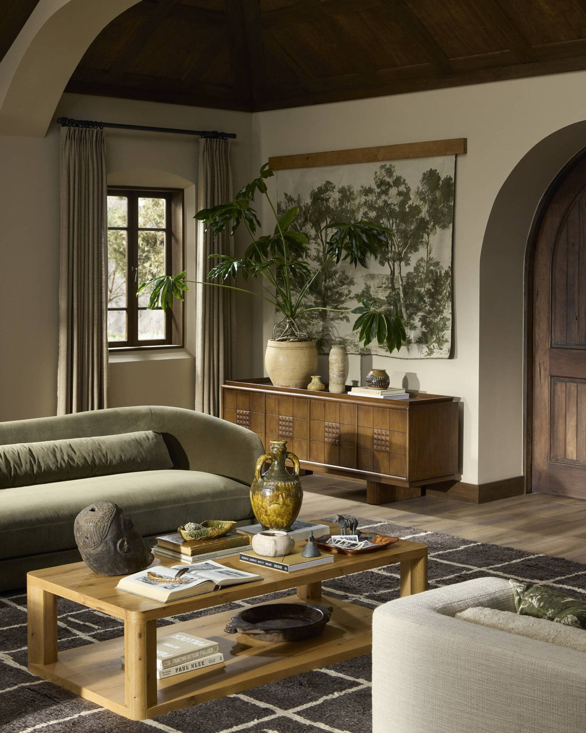 a living room with a couch and a table