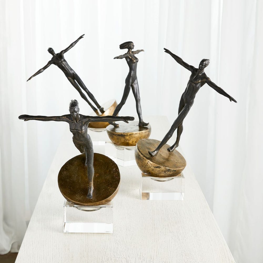 Man Finding Balance Sculpture