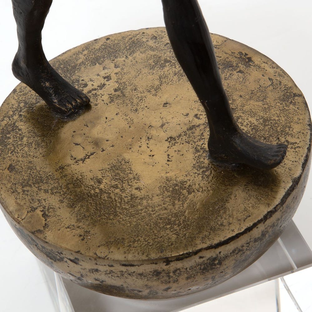 Man Finding Balance Sculpture