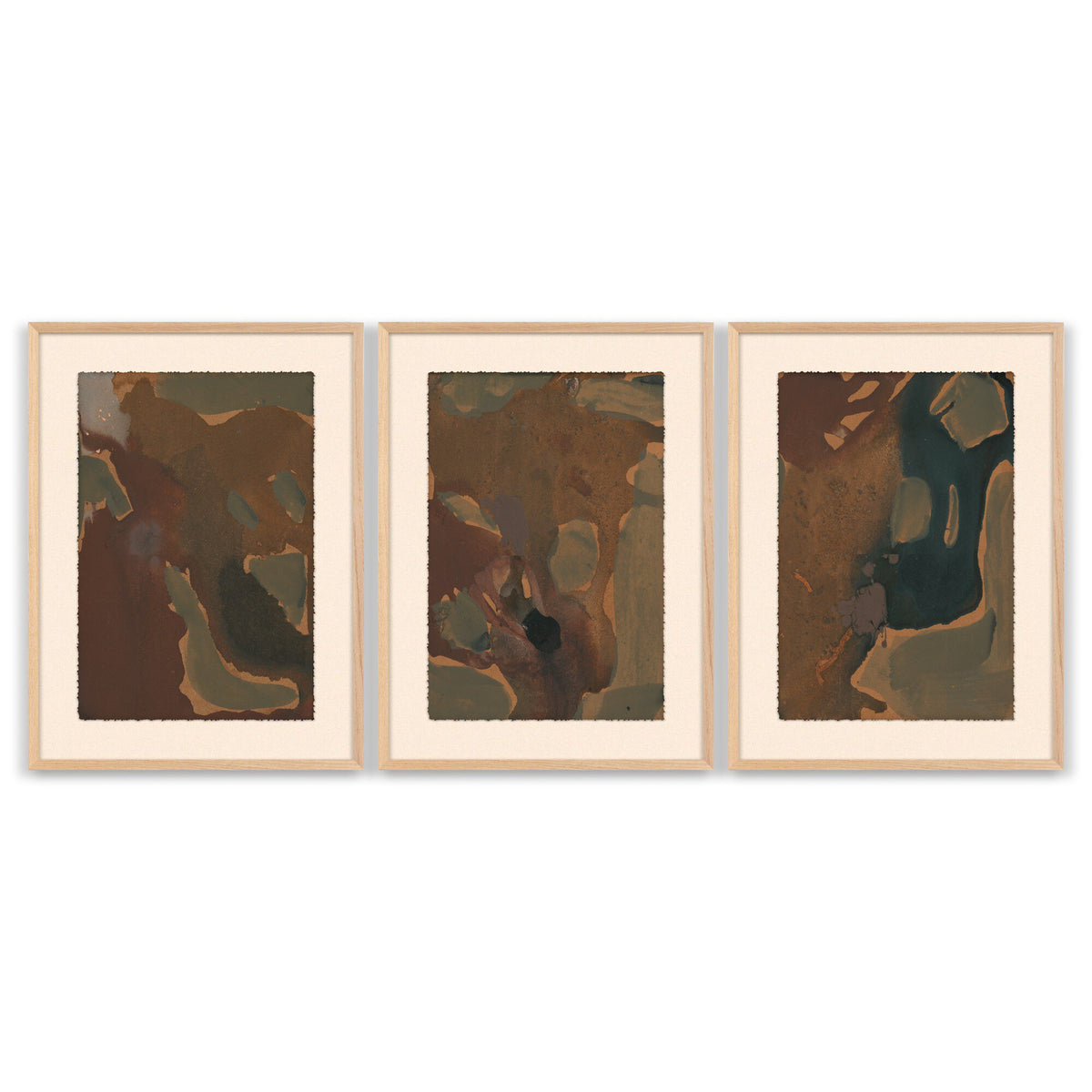 a group of framed art on a wall