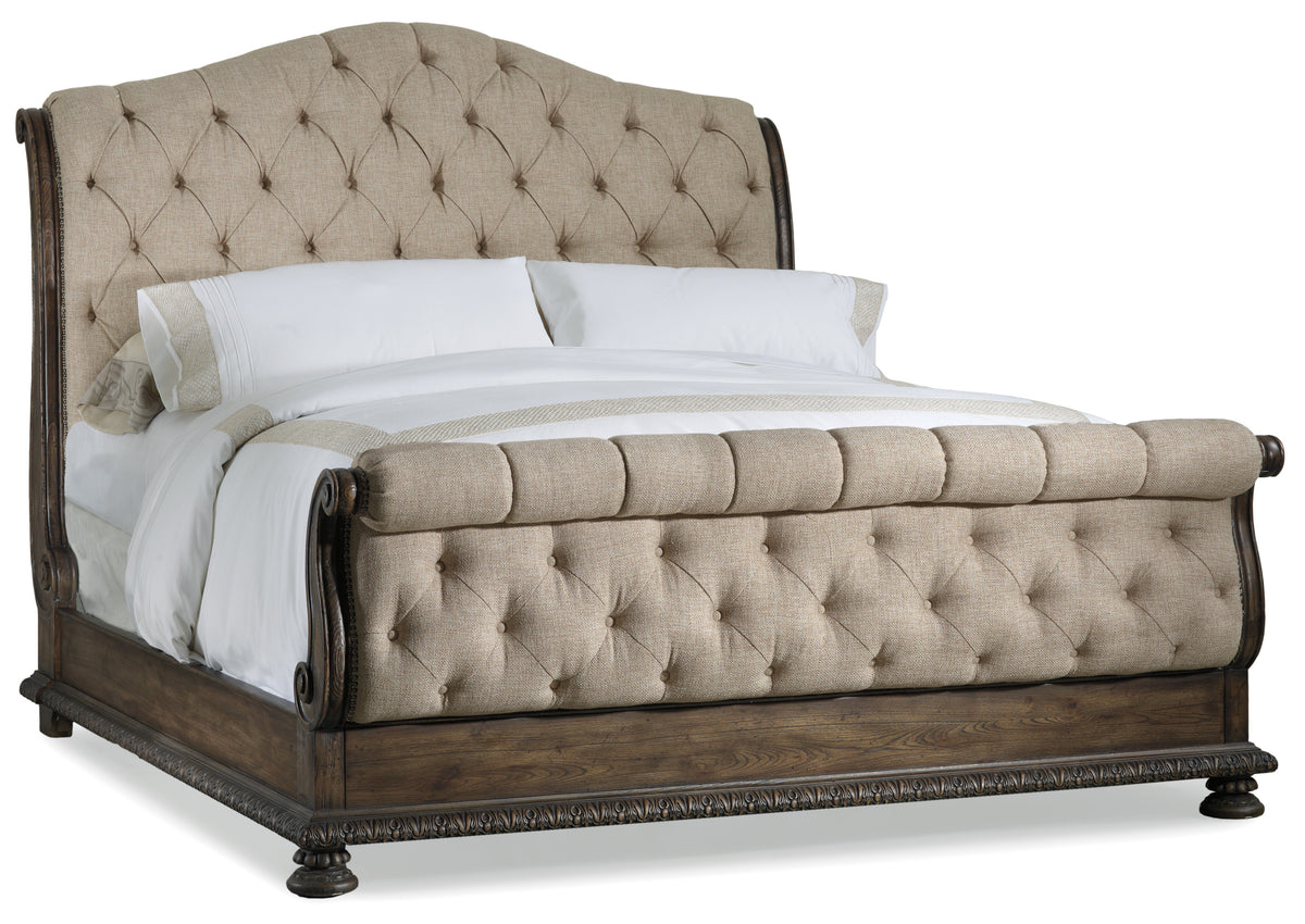 a bed with a white cover