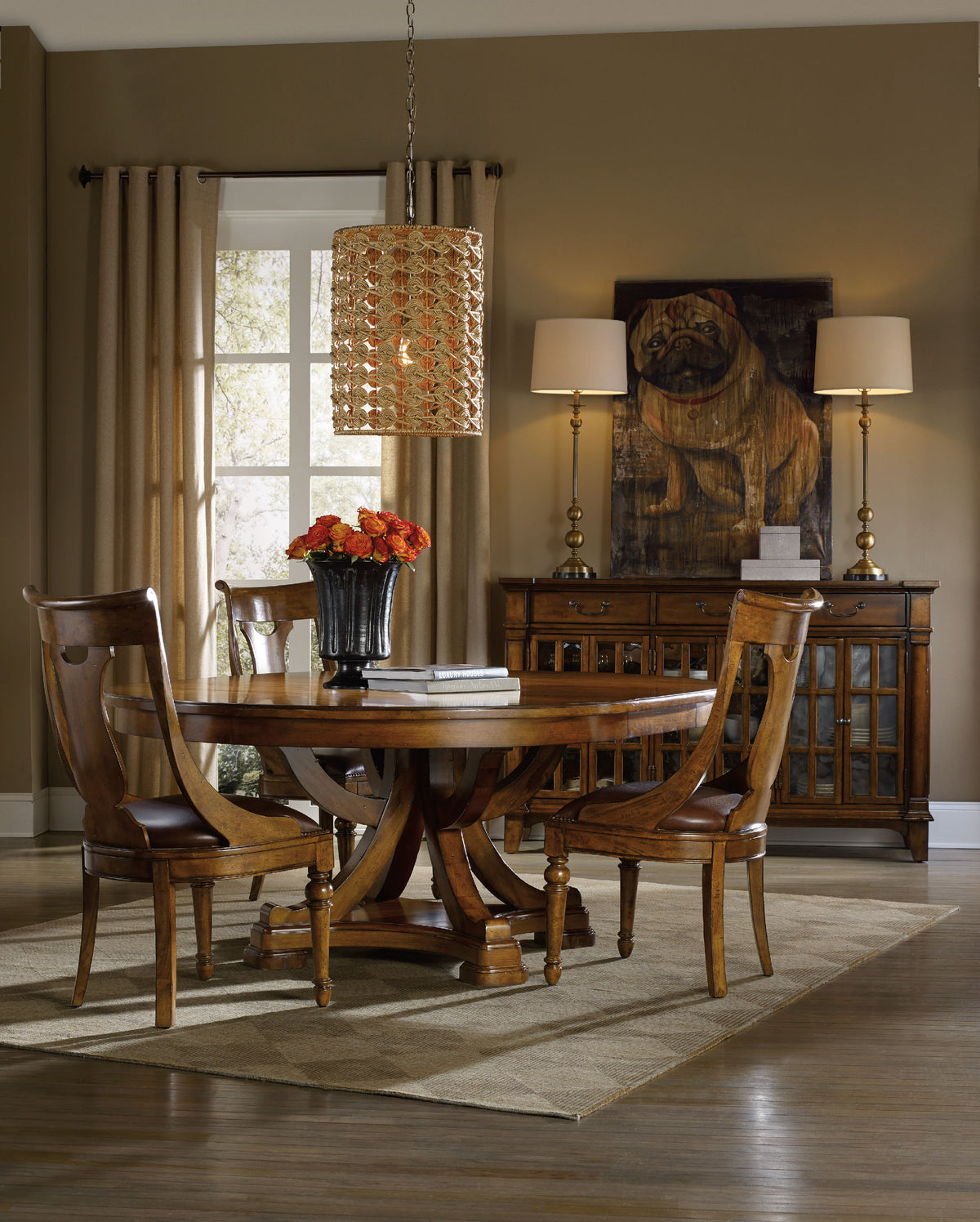 a dining room with a table and chairs