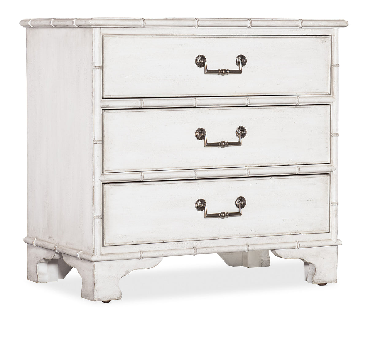 a white dresser with three drawers