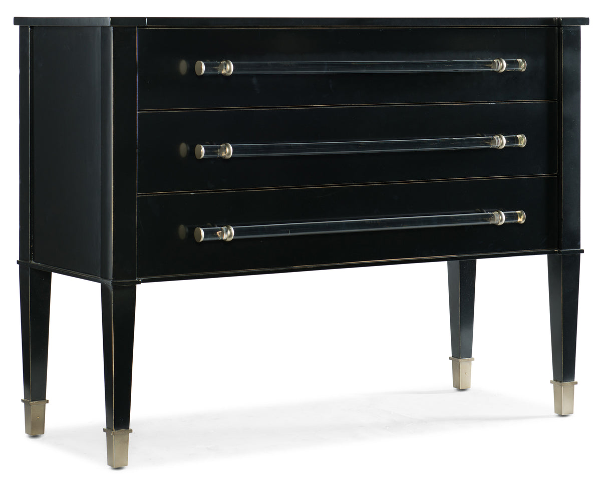 a black dresser with silver handles